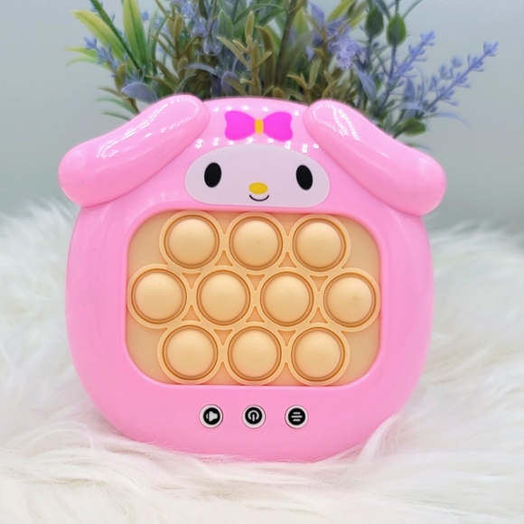 Hello Kitty Handheld Electronic Pop-It Game MY MELODY - Picture 1 of 2